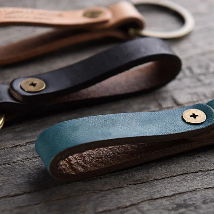 Кожаный брелок с логотипом под заказ оптовая продажа кожаных брелоков