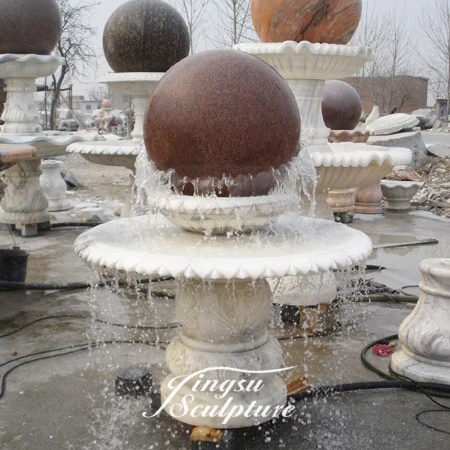 Hand carved granite spinning ball water fountain