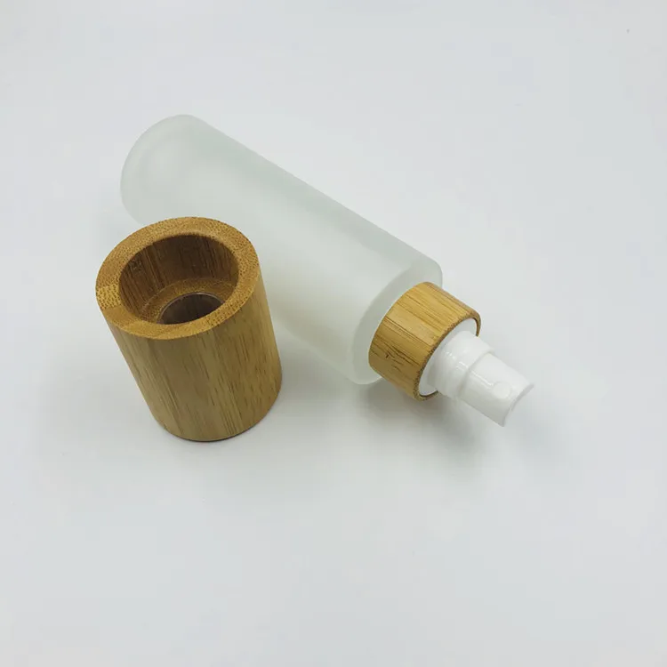 
Top grade matte glass 100ml spray bottle with bamboo cap / frosted bottle pump sprayer packaging / cosmetic packaging dispenser 