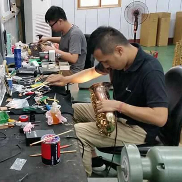 
Professional Case Black Nickel Plated and Gold Keys B Flat Tenor Saxophone 