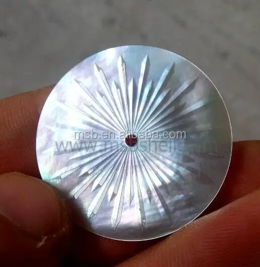 embossed snowflake mother of pearl dial