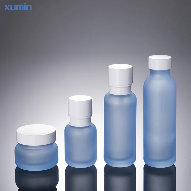 Wholesale 50g glass cream jars and 50ml 110ml 150 ml blue bottle glass 150ml cosmetic glass packaging for skin care bottle