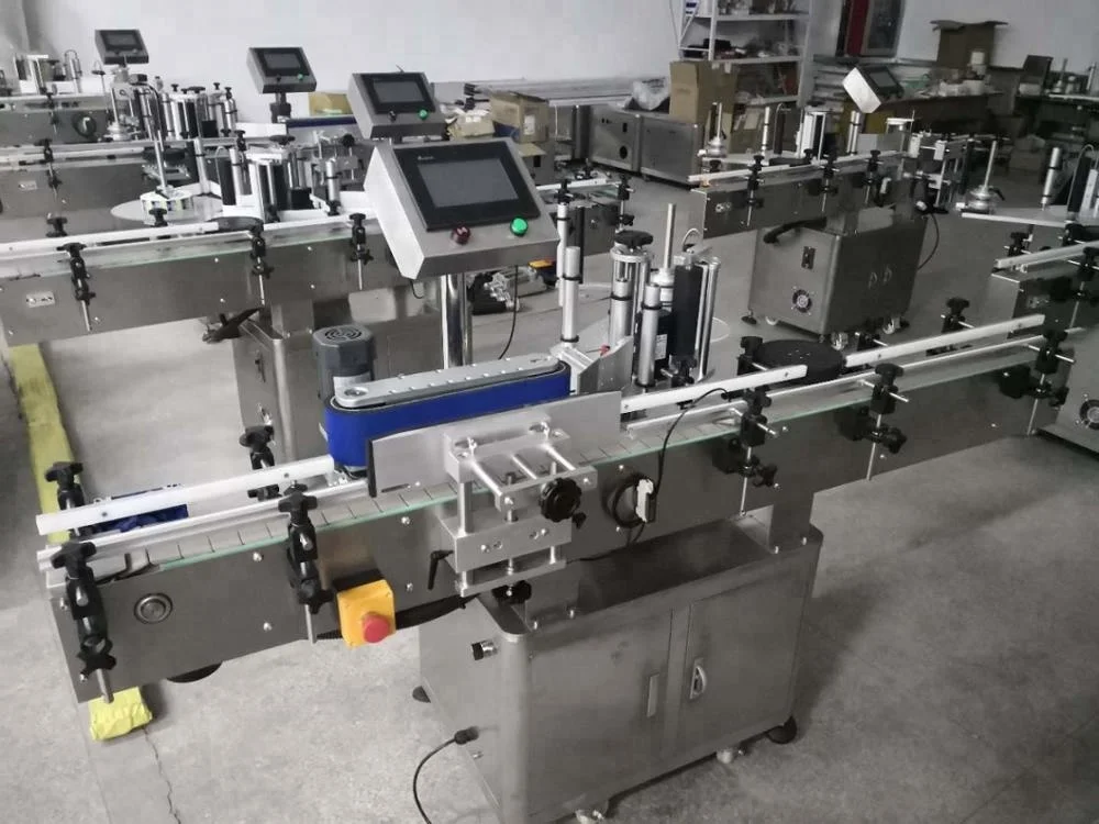 Self adhesive sticker labeling machine for round bottles