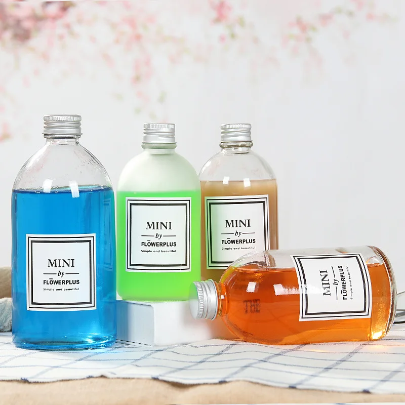 Hot sale custom logo empty boston round glass bottle for juice