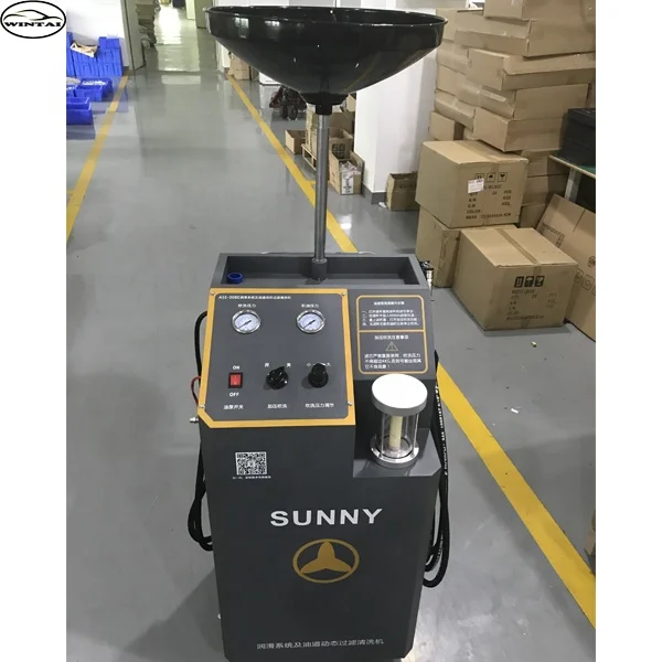 Engine lubricating oil changer engine flushing machine