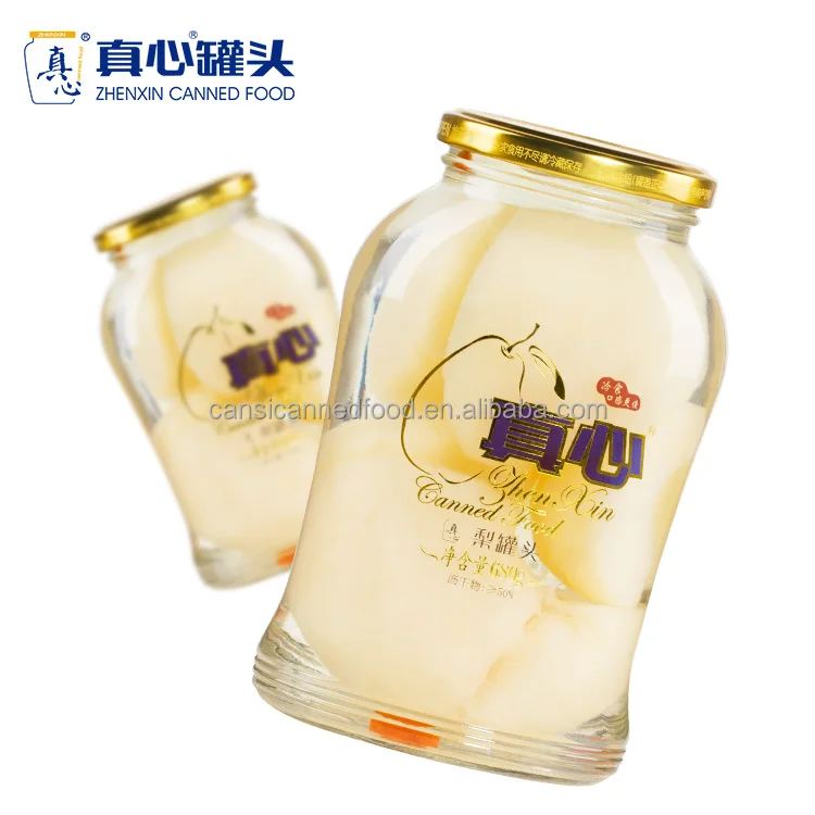 Половинки груши, консервированные в баночках или каменных баночках