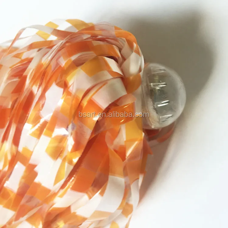 Orange and white LED cheerleading pompom / pom pon on plastic stick