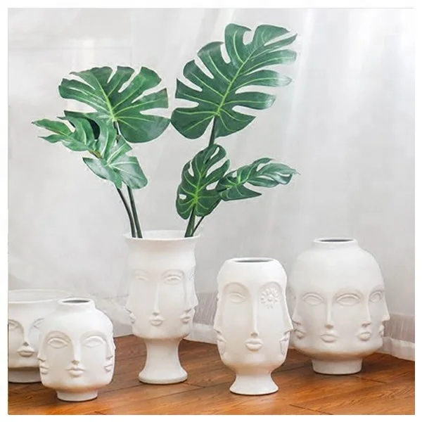 
Chinese Modern porcelain home hotel goods decoration flower vase types of face designs decorative ceramic vase for home decor 