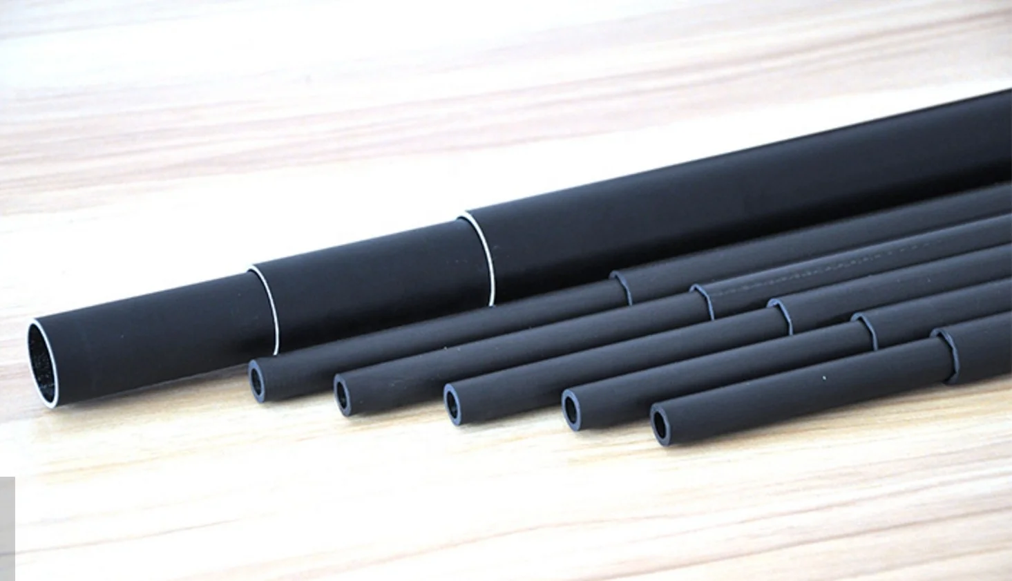 Carbon fiber telescopic pole for swimming pool maintenance pole