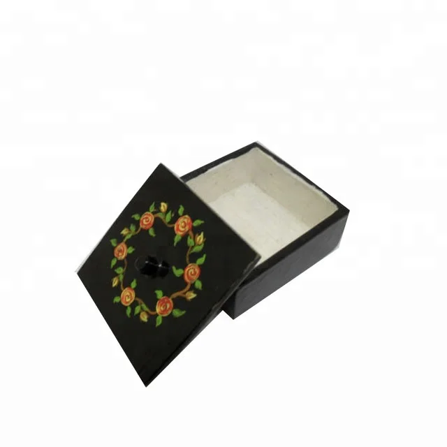 Hand-painted wooden trinket box.Black with a ring of flowers on lid.Pretty gift