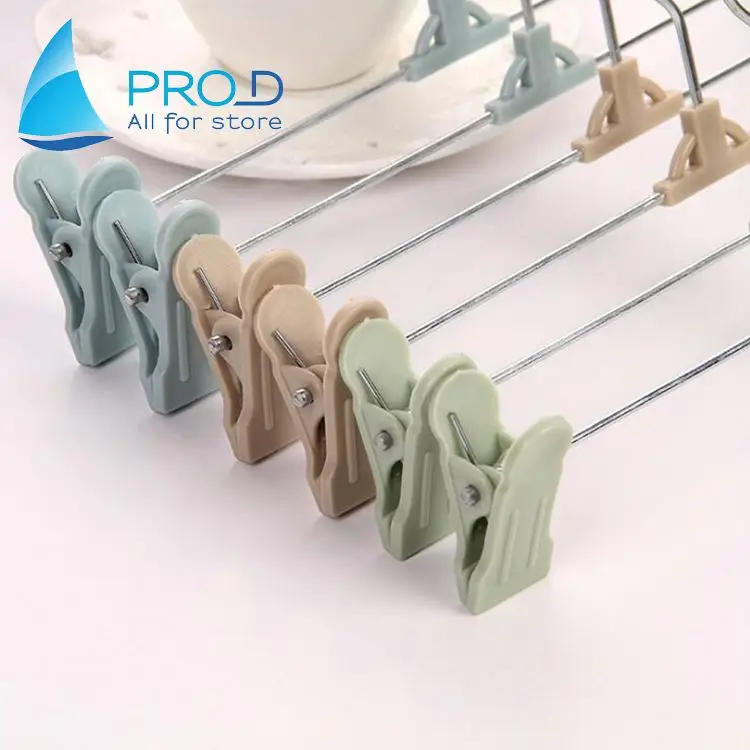 Wholesale retractable plastic multi-purpose clothes hanger trouser clip