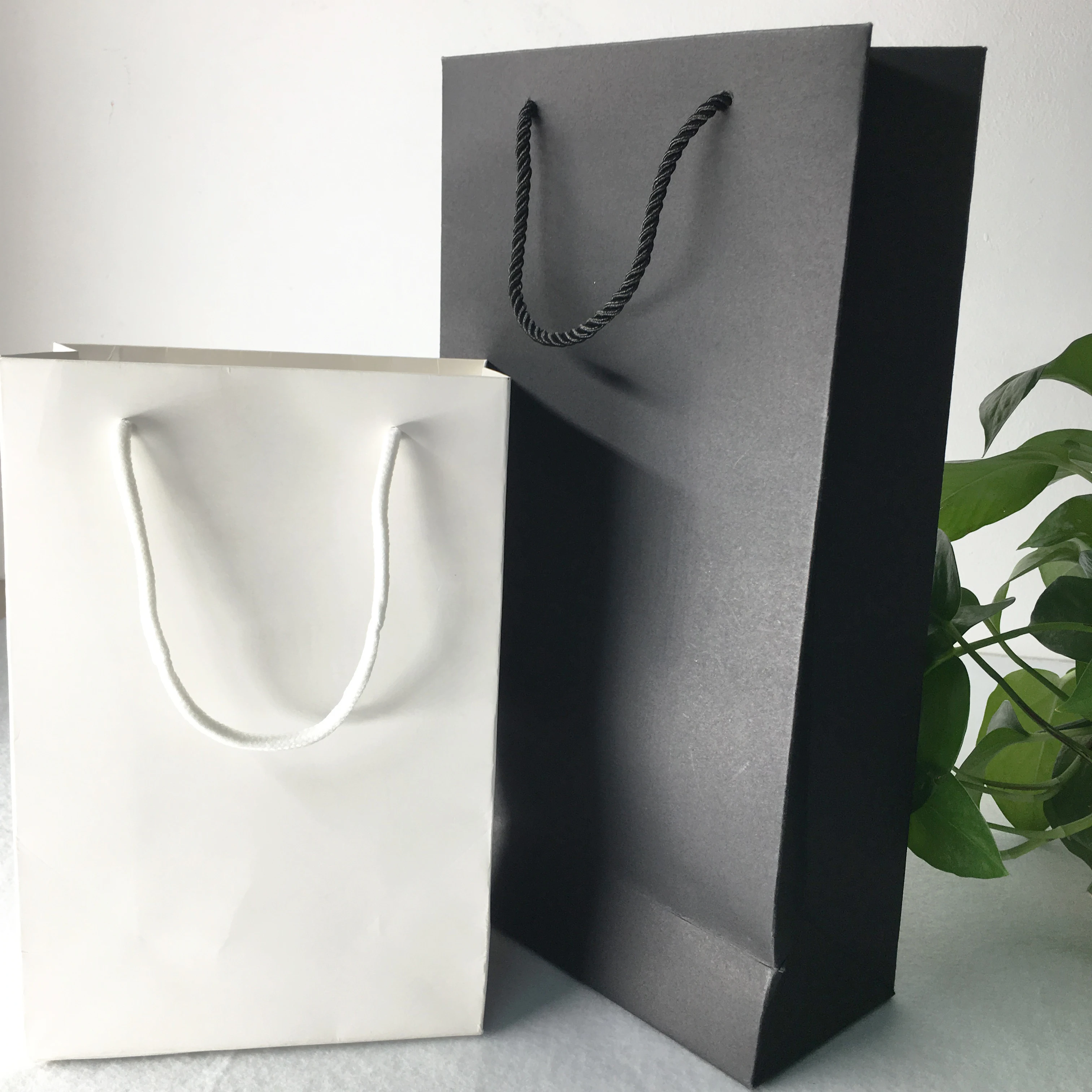 custom vertical type black/white cardboard paper bag with cotton rope