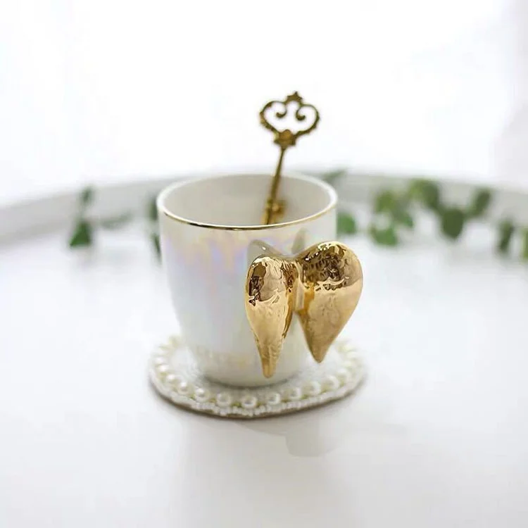 Handmade ceramic golden angel wings coffee cup mug