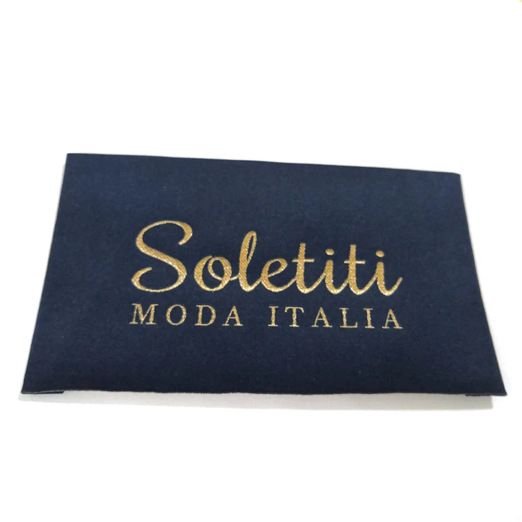 High density gold thread woven label with fold