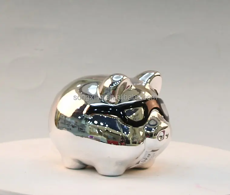 silver ceramic mini piggy bank with black glass
