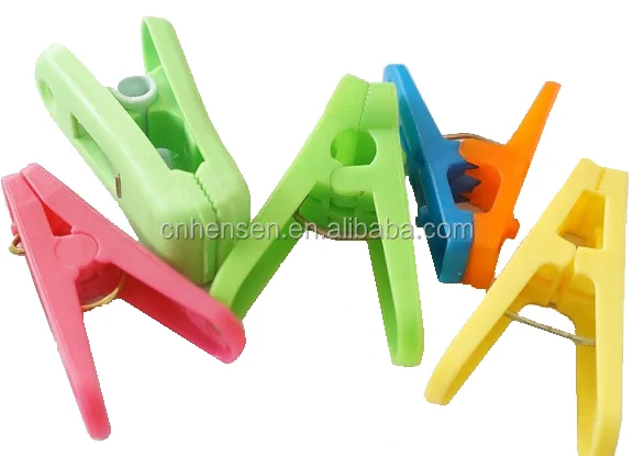 Clothes-pin assembly making machine, clothespin assembling machine