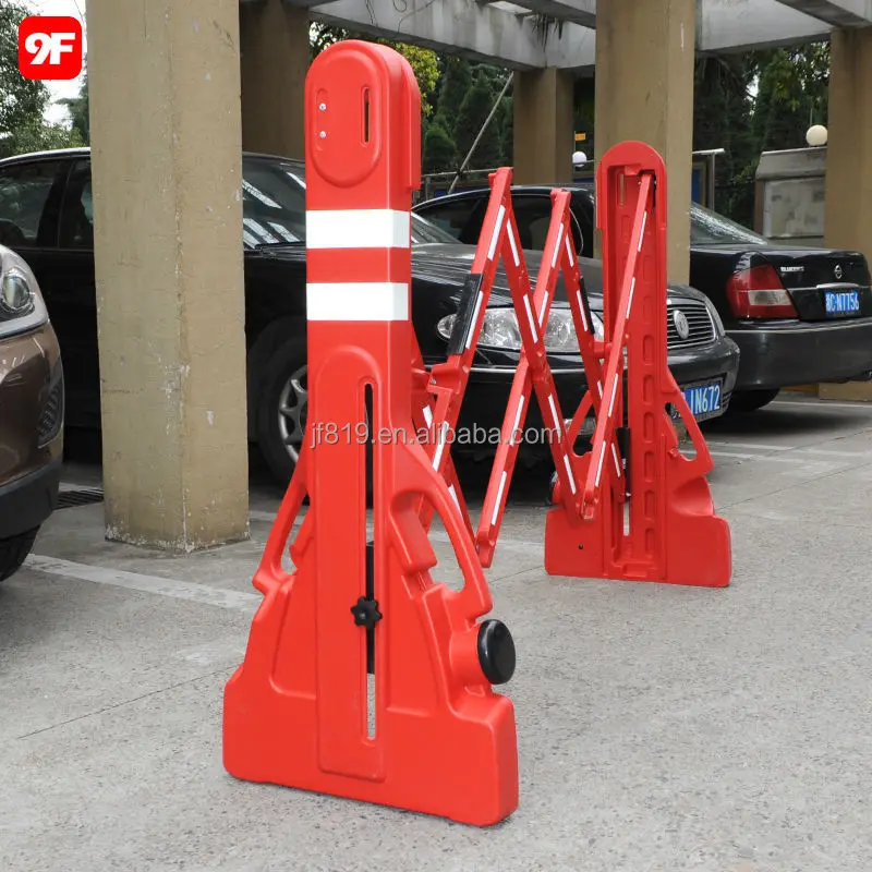 Plastic expandable portable traffic safety barrier fence