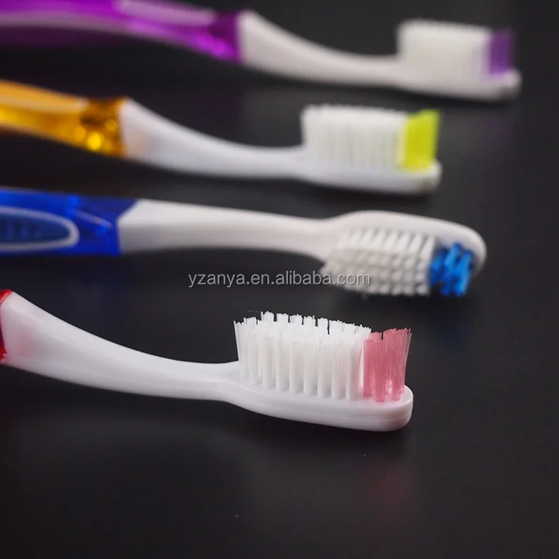 soft rubber handle adult toothbrush with tongue cleaner