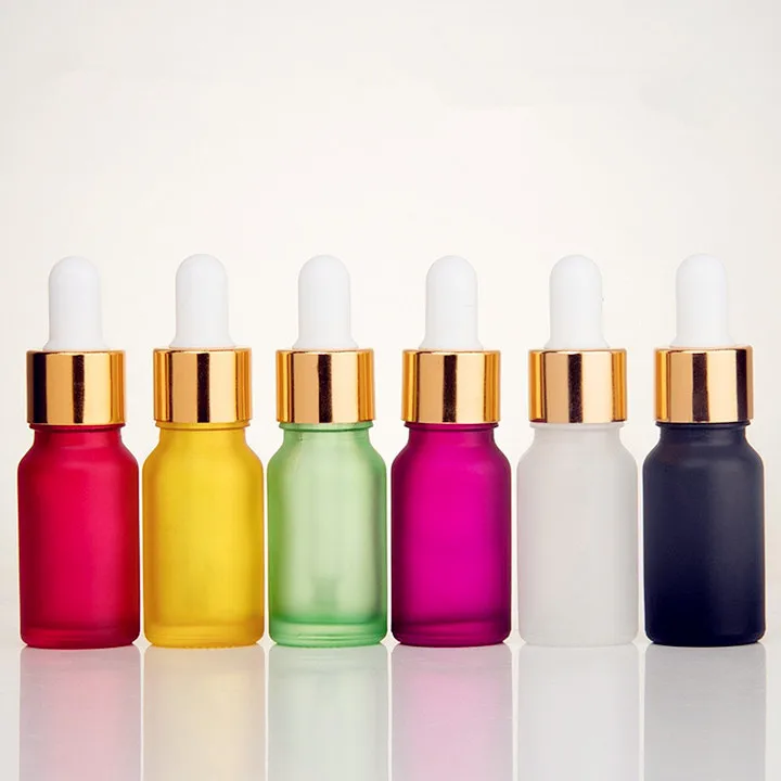 5ml 10ml 15ml small glass colored essential oil bottle with gold dropper cap, empty cosmetic cuticle oil bottle for sale