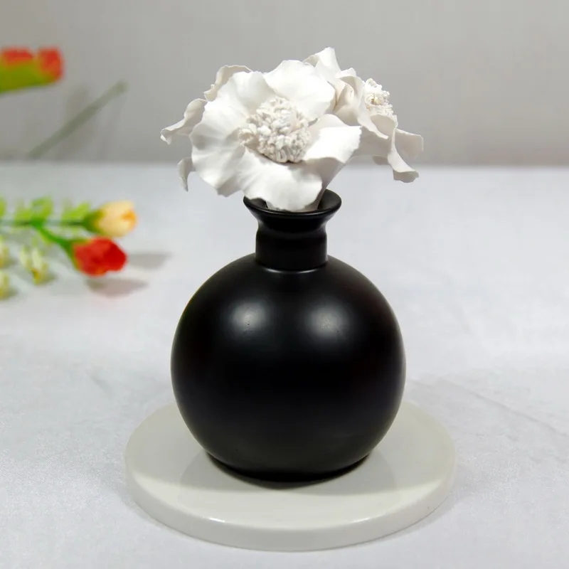 
White ceramic round bottle nebulizer essential oil diffuser 