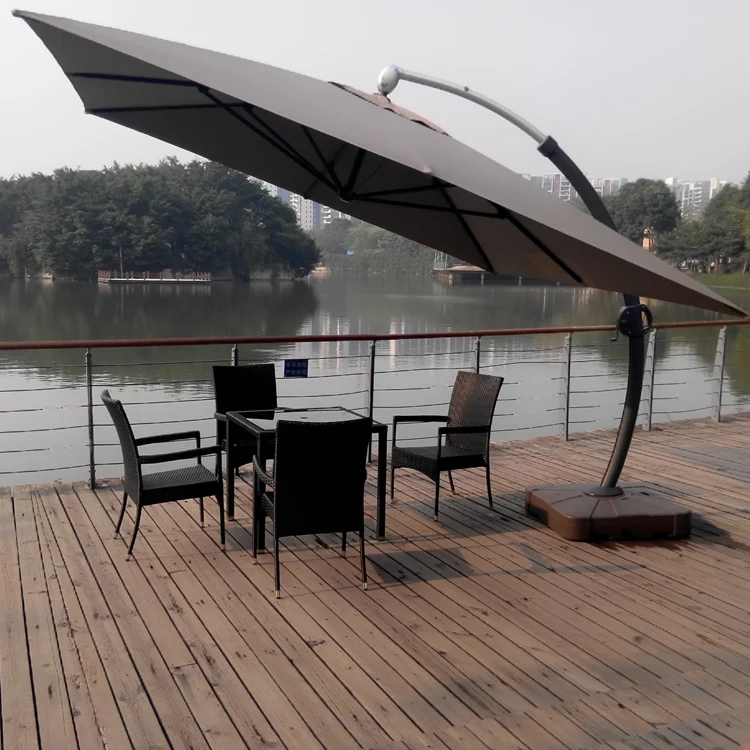 huge red bull outdoor beach umbrella with water filled base