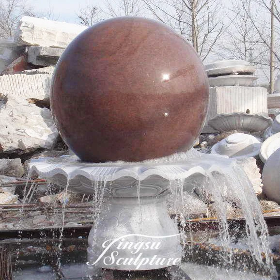 Hand carved granite spinning ball water fountain