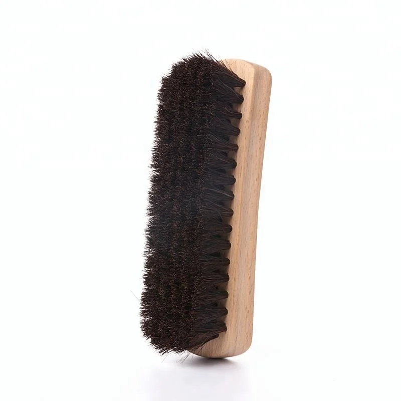 Scrub wooden dry brush in car washer
