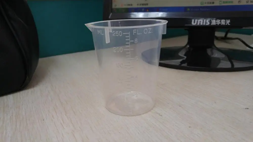 
wholesale factory support 50ml plastic measuring cup 