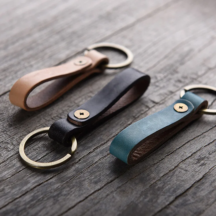 Кожаный брелок с логотипом под заказ оптовая продажа кожаных брелоков