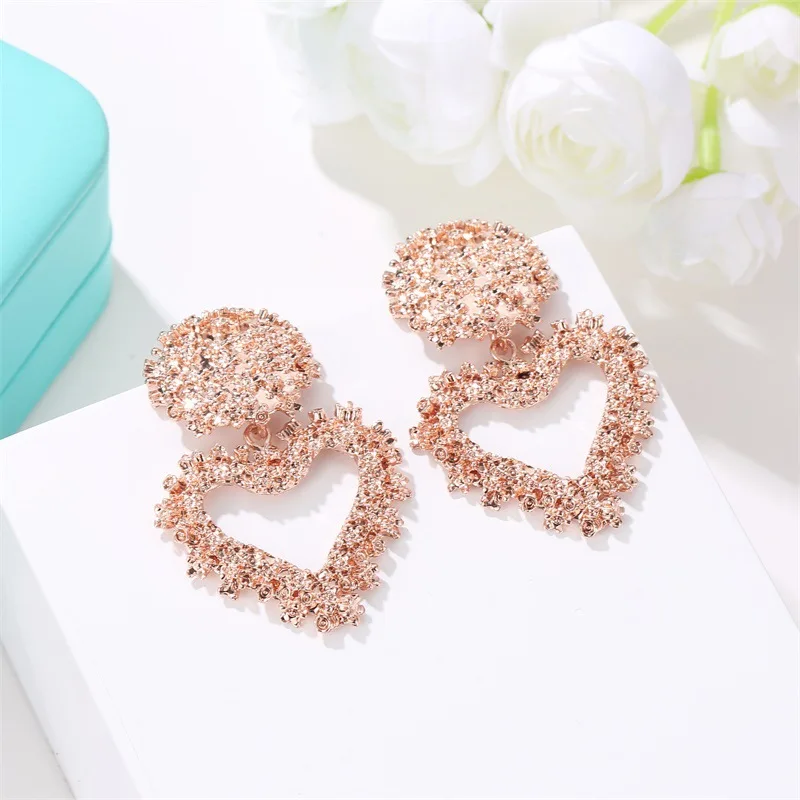 Fashion new heavy metal hollow love 14 k gold earrings