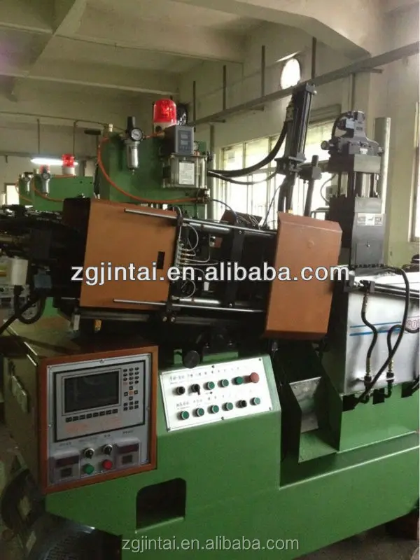 
 Машина для изготовления металлических слайдеров на молнии  