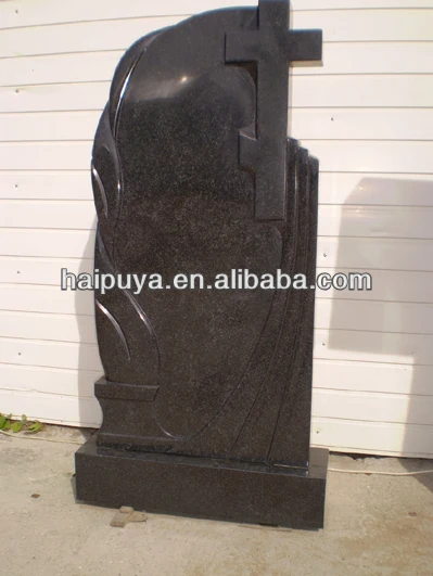 black headstone and monument