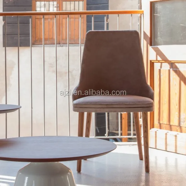 
modern chair with round backrest and wooden legs 