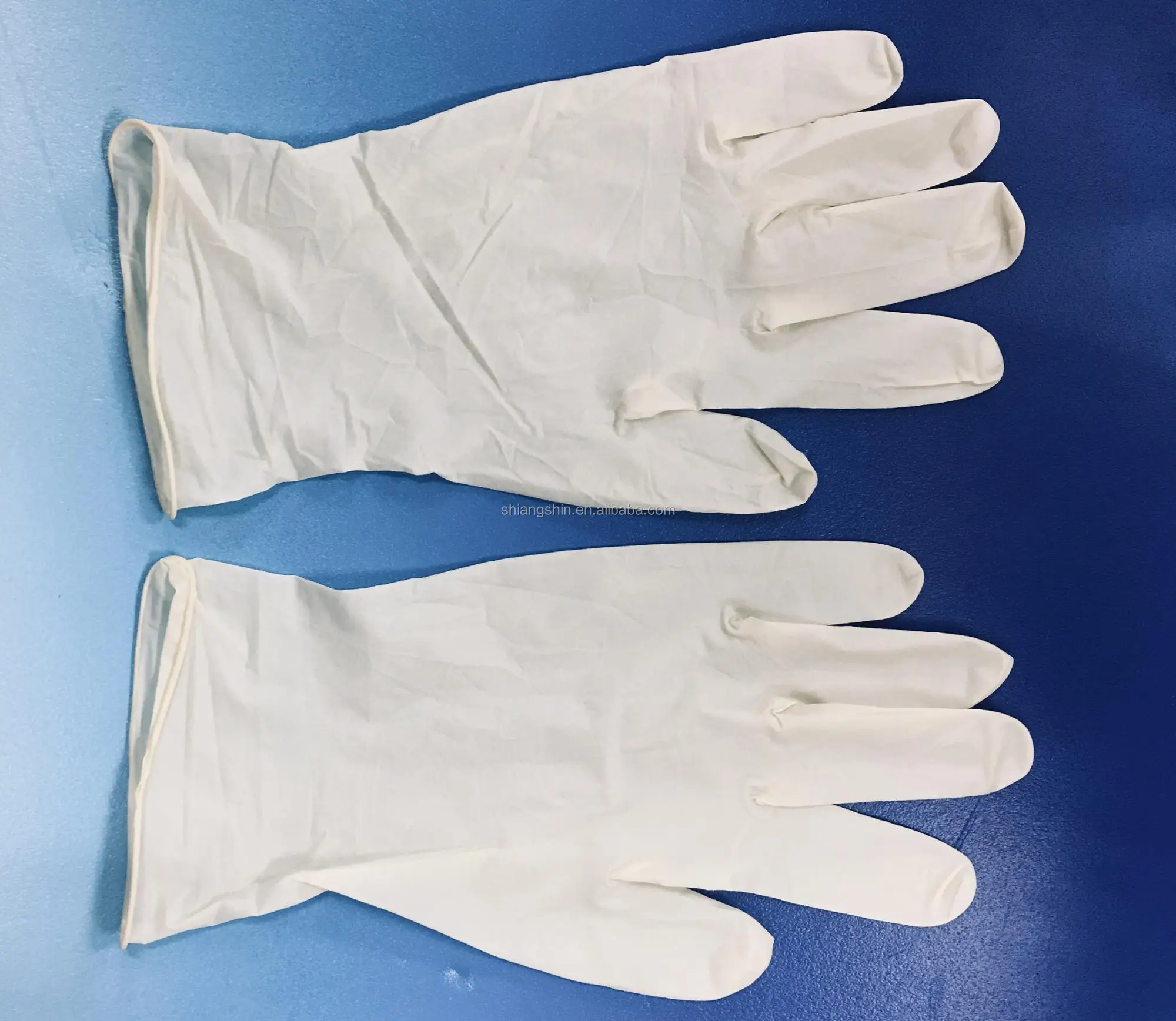 Медицинские одноразовые перчатки