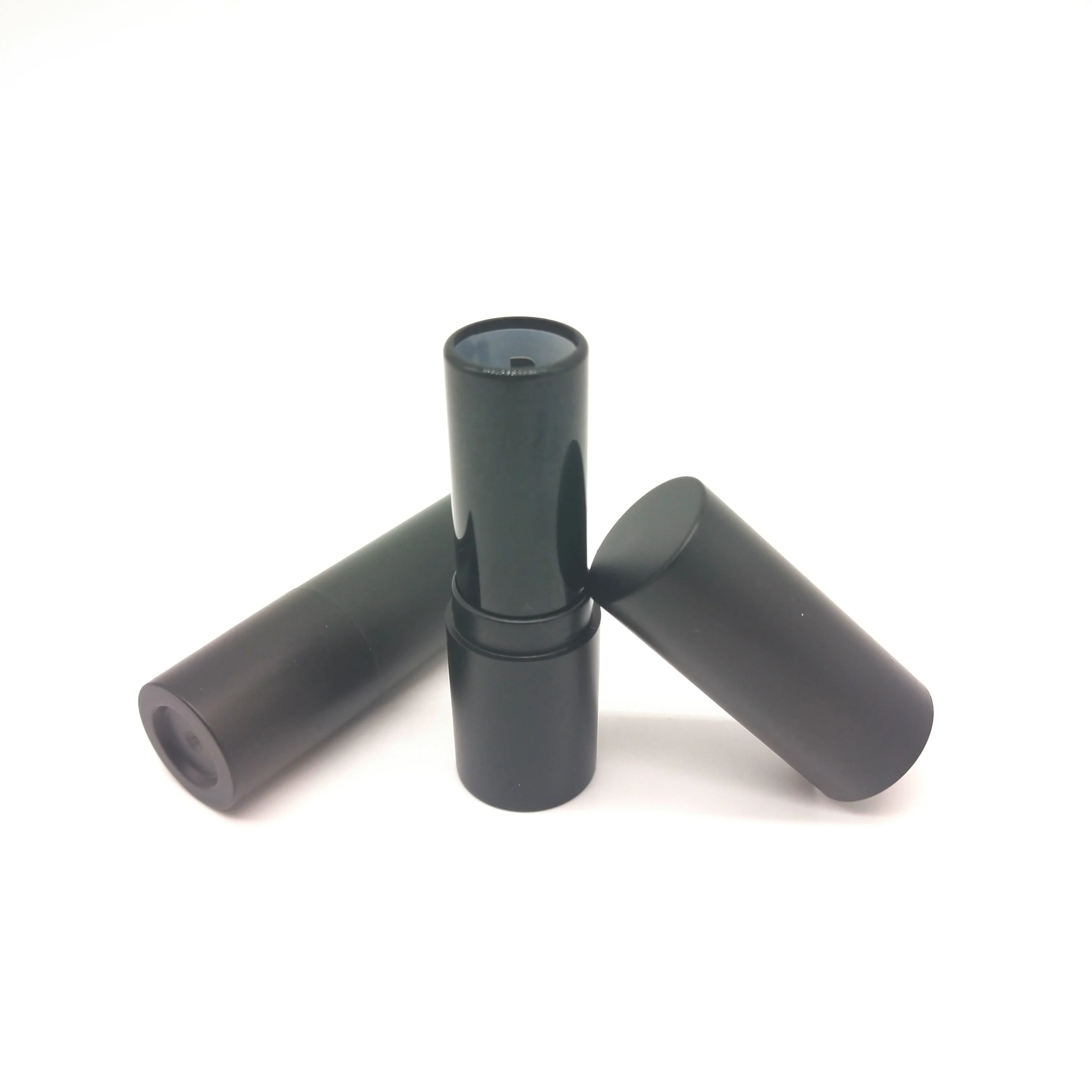Wholesale high quality stock round black lipstick tube cosmetic packaging for lip balm matte black lipstick container