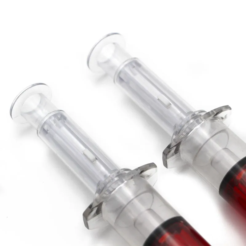 
extra big plastic liquid jumbo syringe ball pen injection ball pen 