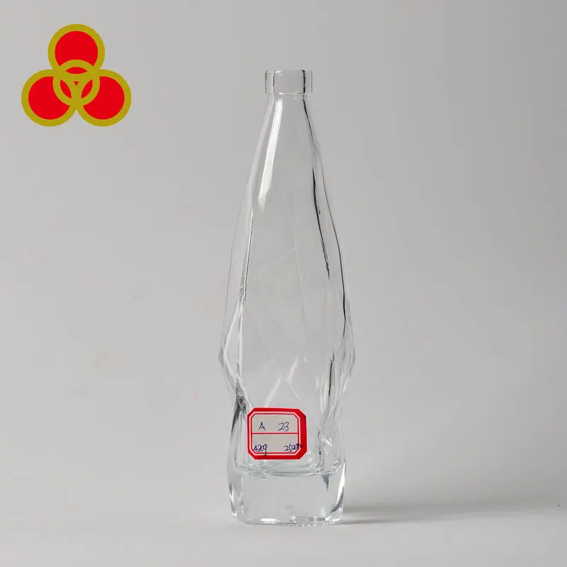 
wholesale diamond surface glass wine liquor bottle Glass brandy bottle with lid 