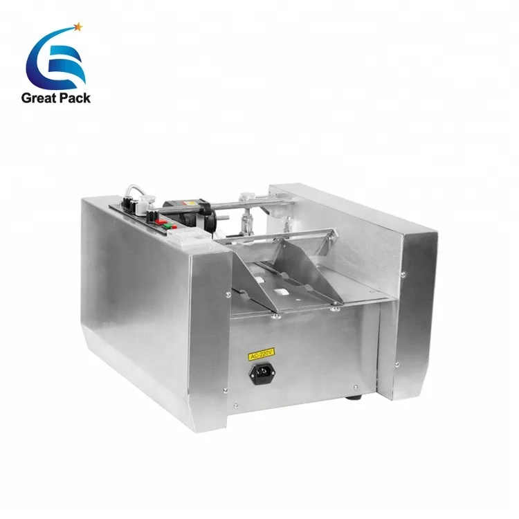 automatic embossing and solid ink date coder/ carton coding machine