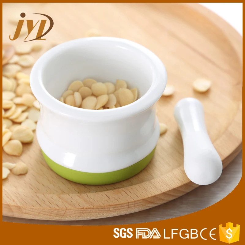 
China factory new design mini size herb spice small ceramic mortar and pestle with Silicone anti-skid ring 