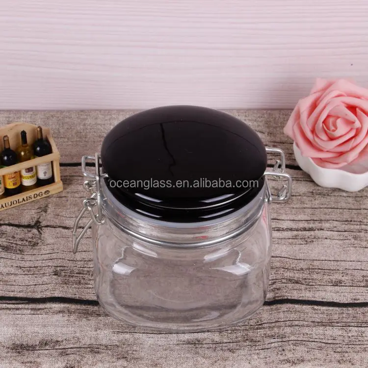 footed square glass jar fancy mason glass jar/mason honey jar with ceramic clamp lid