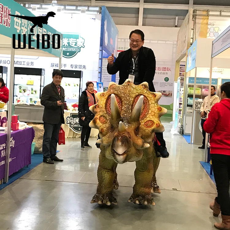 Walking dinosaur ride animatronic dinosaur ride