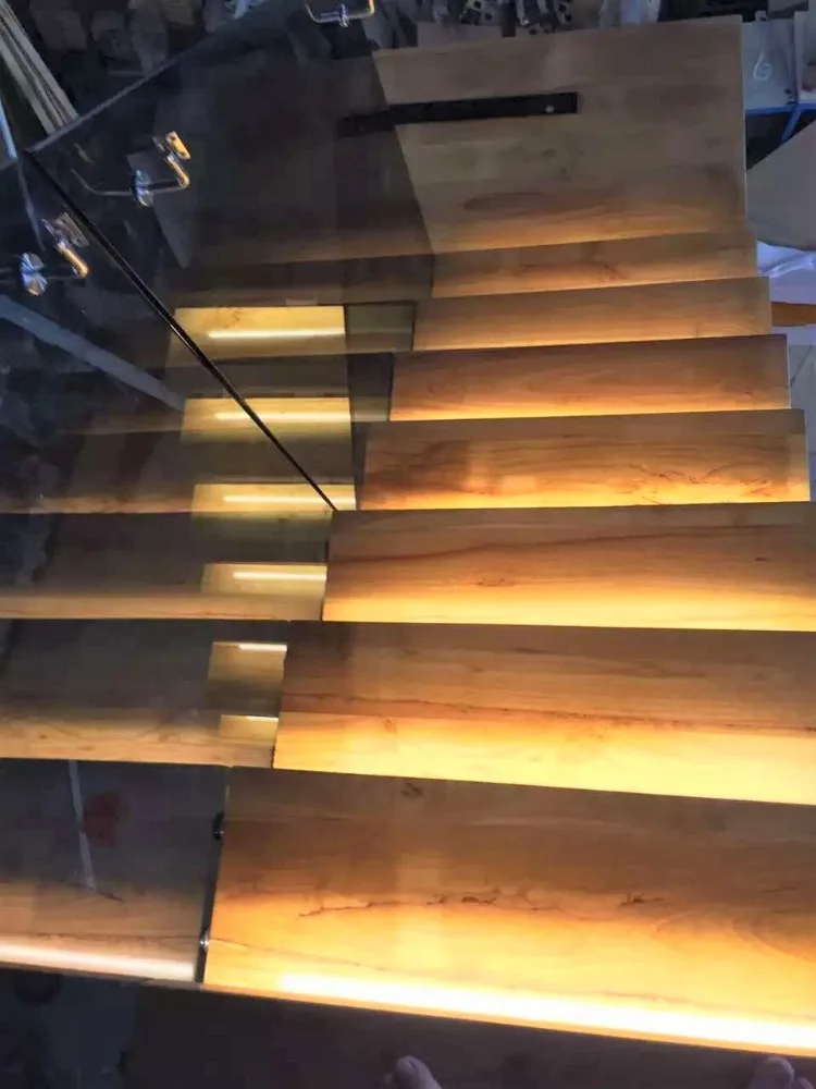 
lighted solid wood ladder staircase glass railing designs 