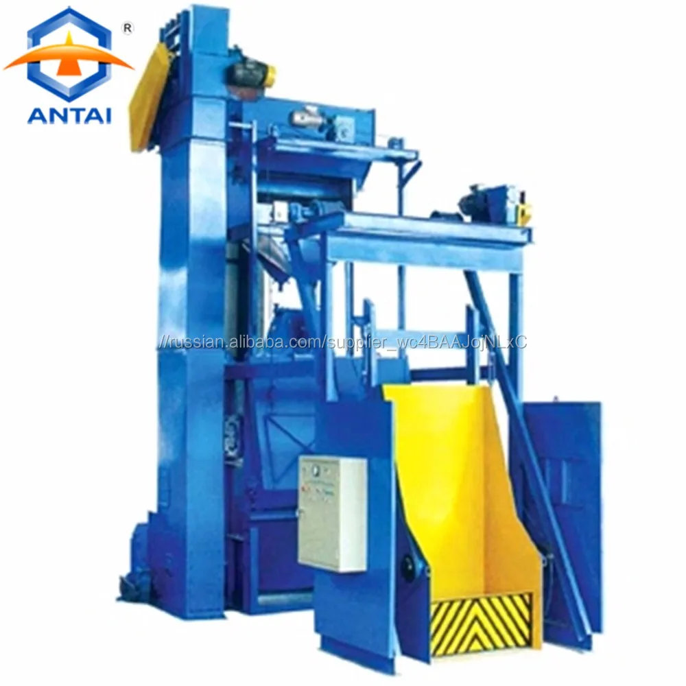 Drum type shot blaster with belt conveyor