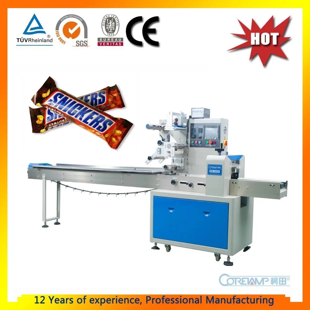 Потоковая автоматическая упаковочная машина для конфет мюслей энергетических шоколадных батончиков