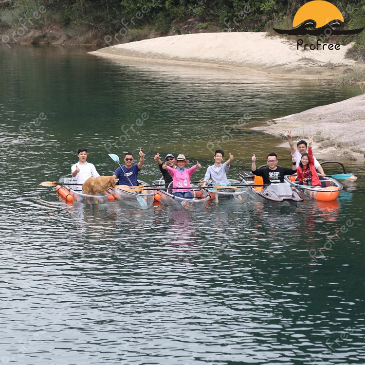 
transparent kayak with outrigger and airbag ans fishing life jacket 