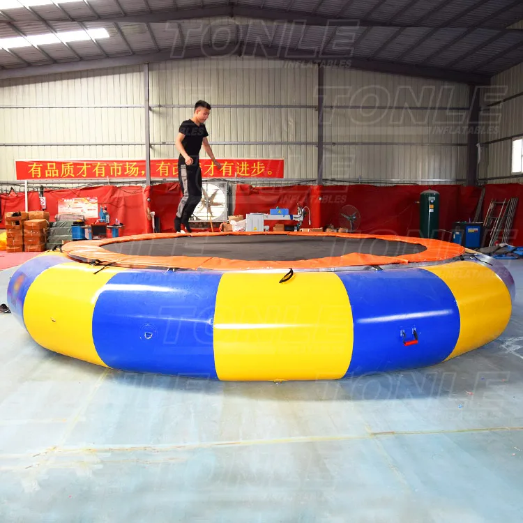commercial cheap inflatable floating water trampoline with slide for sale