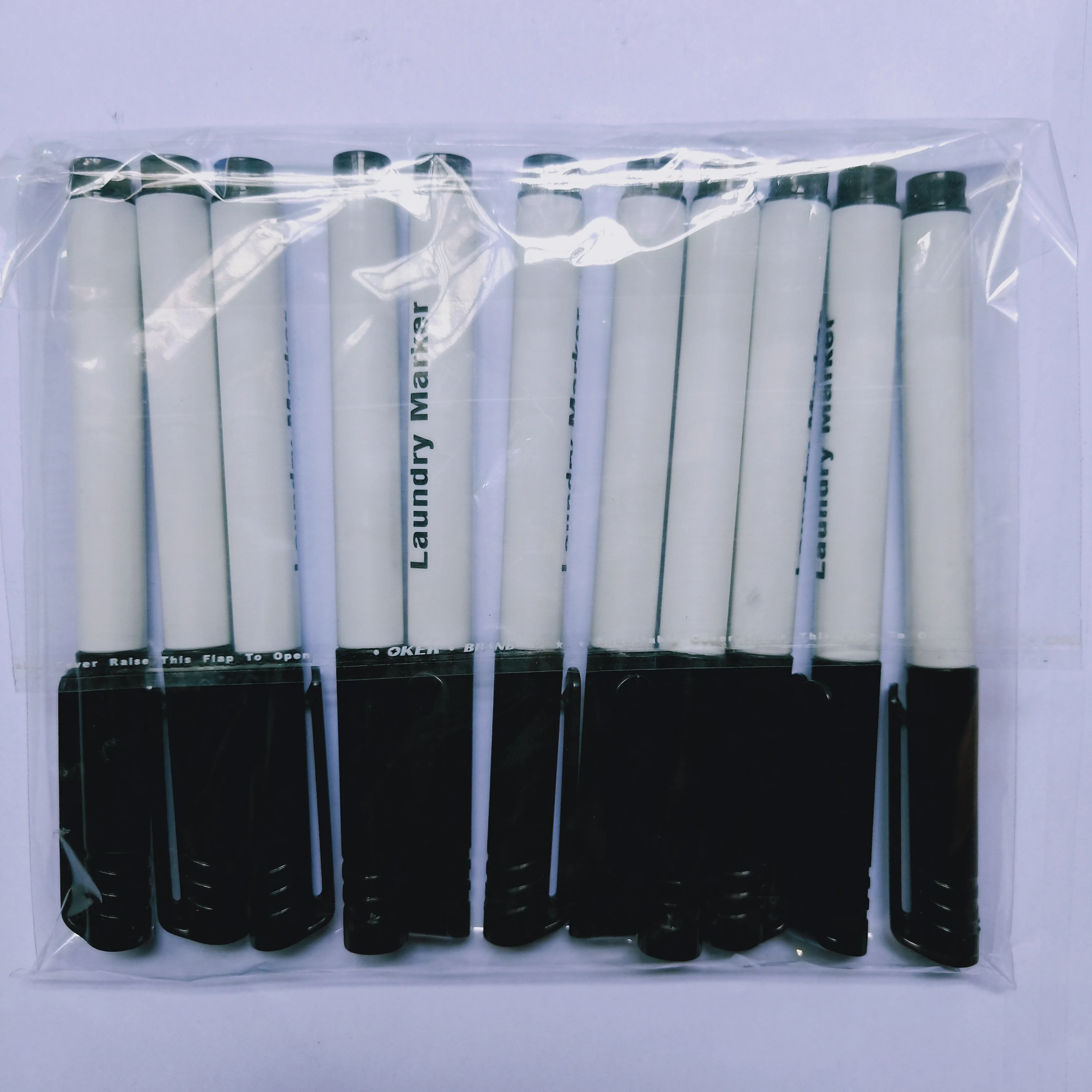 2023 cheap eco-friendly 12 colors permanent fabric marker non-toxic clothing laundry marker pen creative textile pen with clip