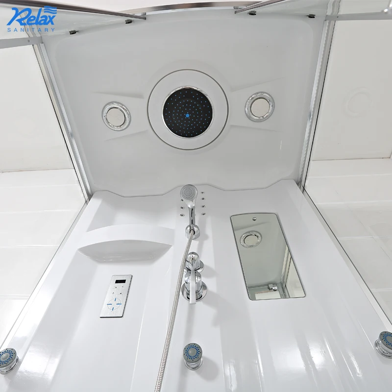 A simple designed bathroom shower room with a white steam shower stall and a walk-in shower room