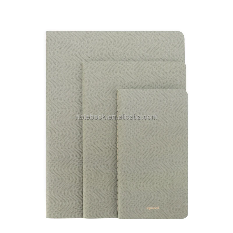 Squared notebook softcover list of office stationery items