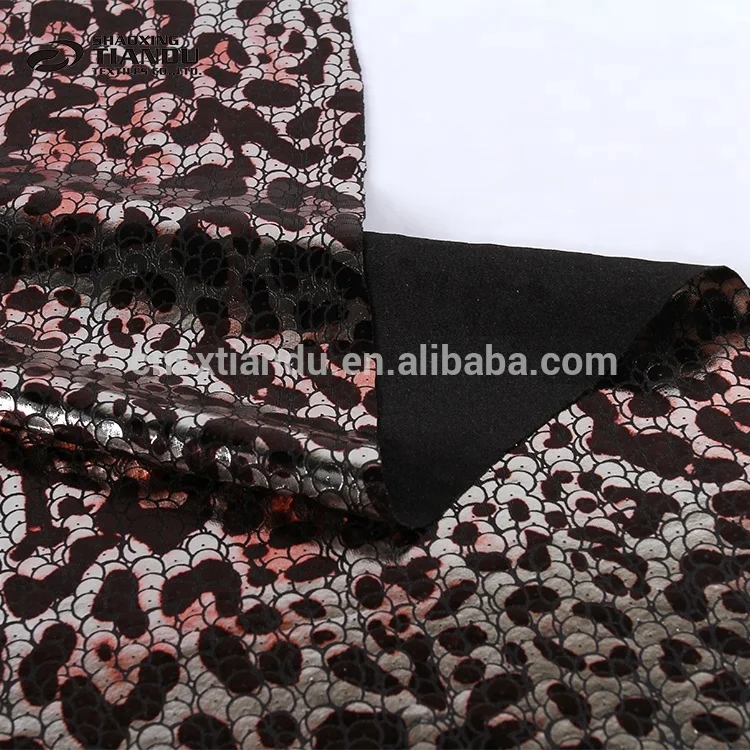 hot selling new fashion low price embossed leopard print gold 3D foil knitted fabric